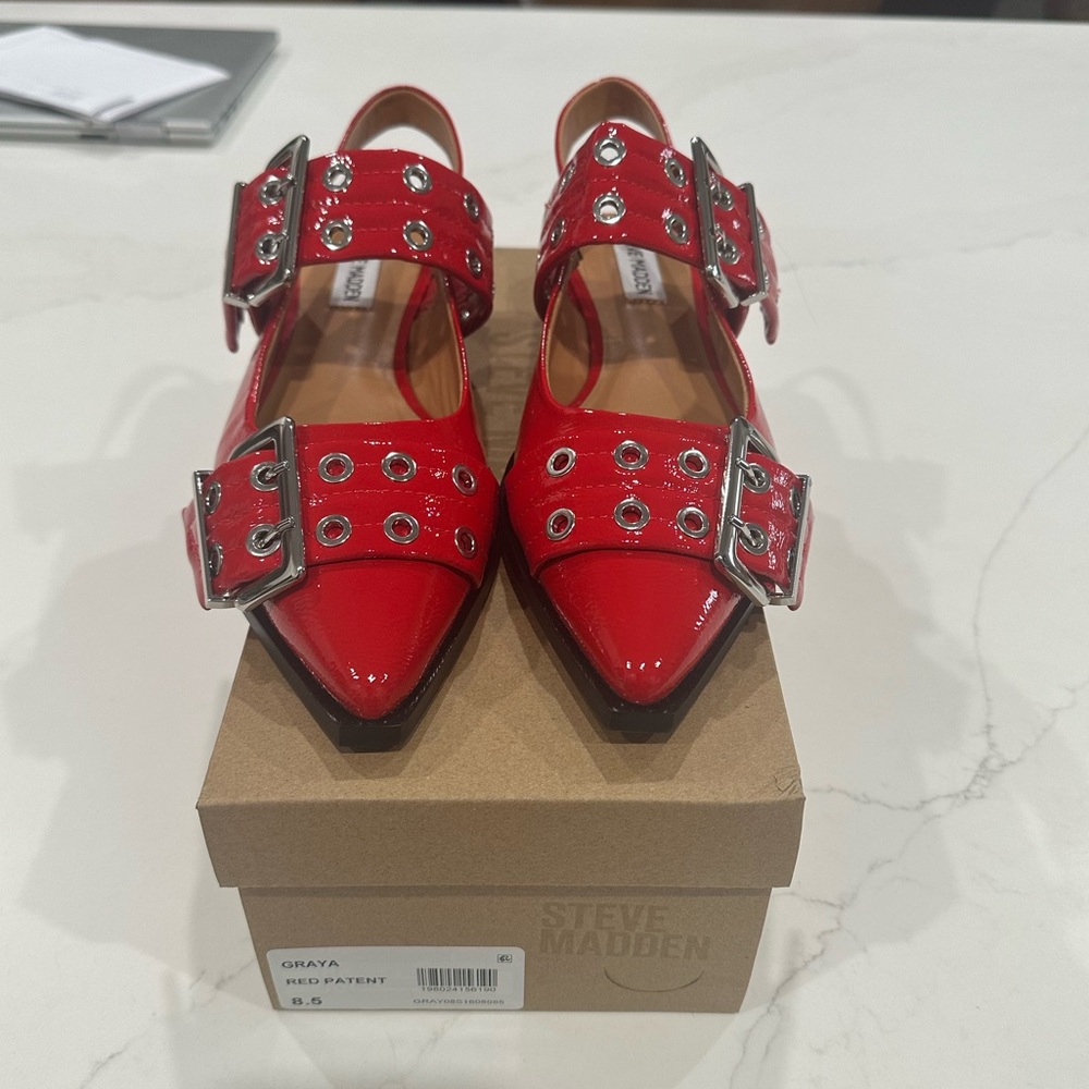 New worn. Steve Madden big buckle flats